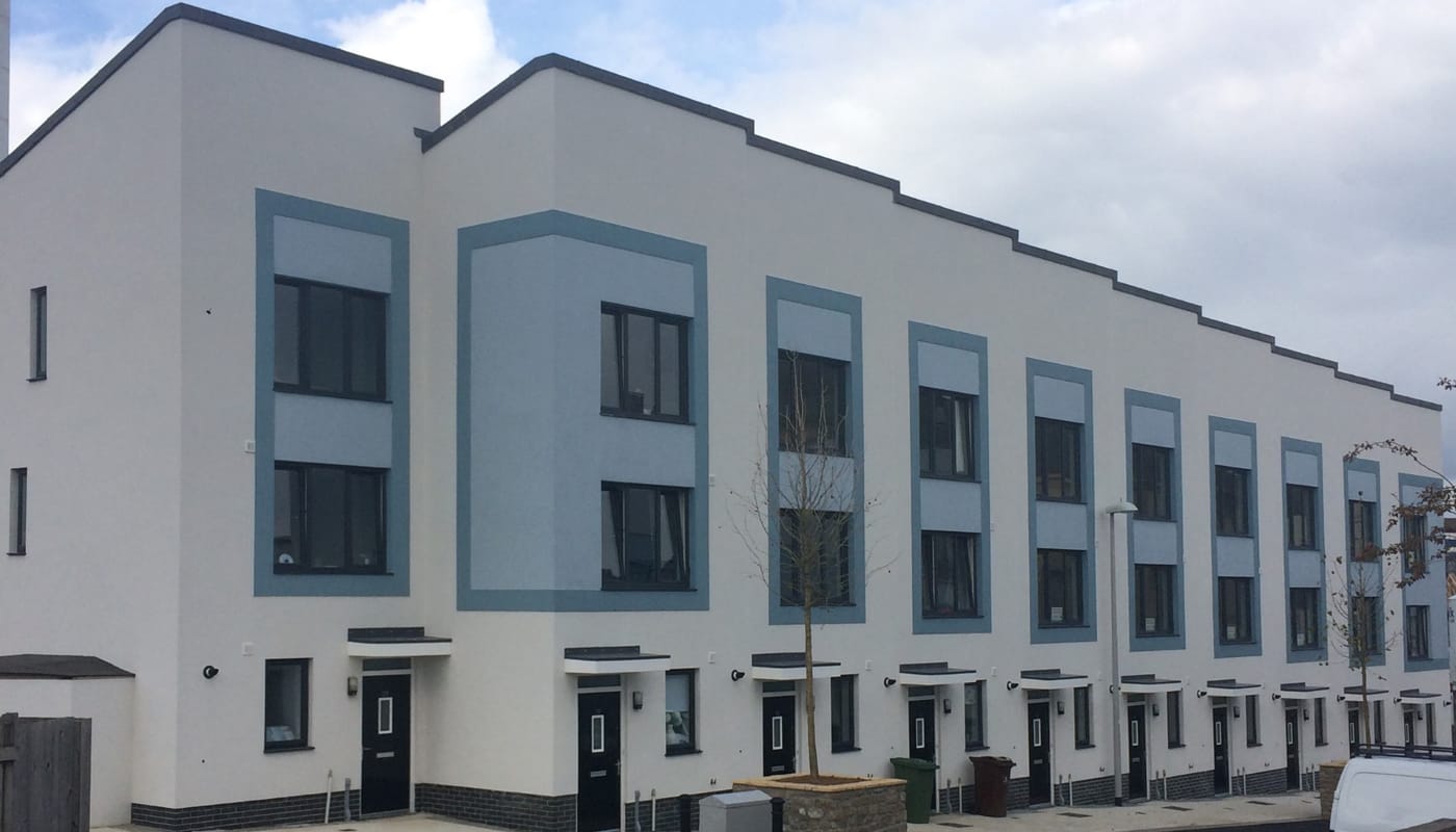 LINDEN HOMES: Installation of monocouche scrape back render systems to new-build residential developments across the South West of England.
